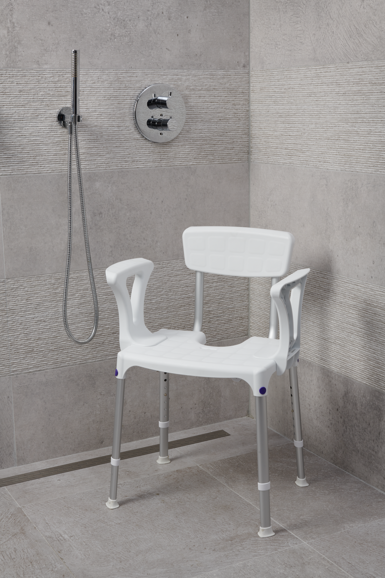 SecuCare Quattro Showerchair with hygiene cutout, backrest and armrests